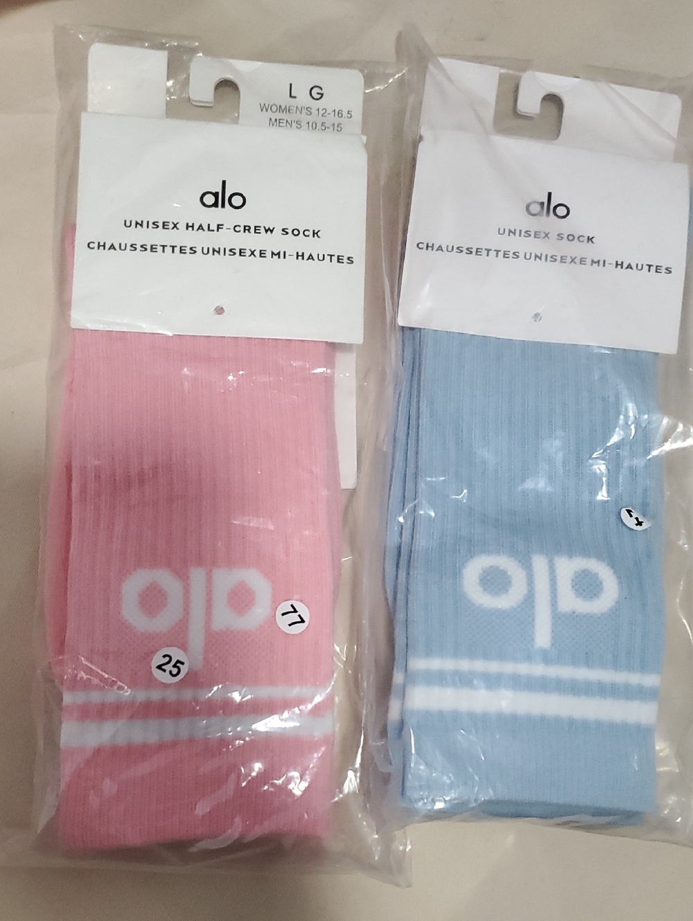 ALO Yoga Unisex Half-Crew Socks in Pink and Light Blue